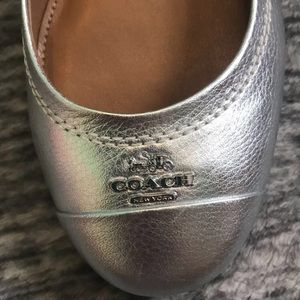 NEW WITH TAGS! silver coach flats!!